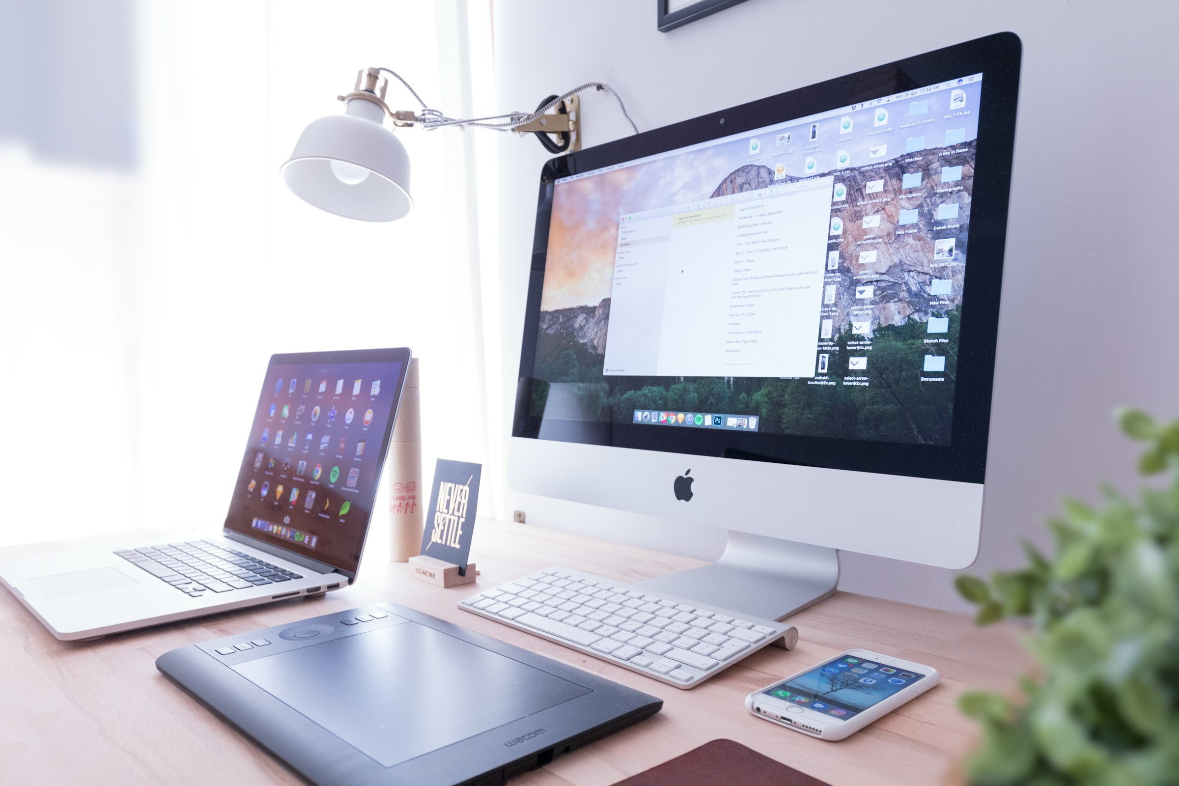 Laptops, mobile devices, a desk